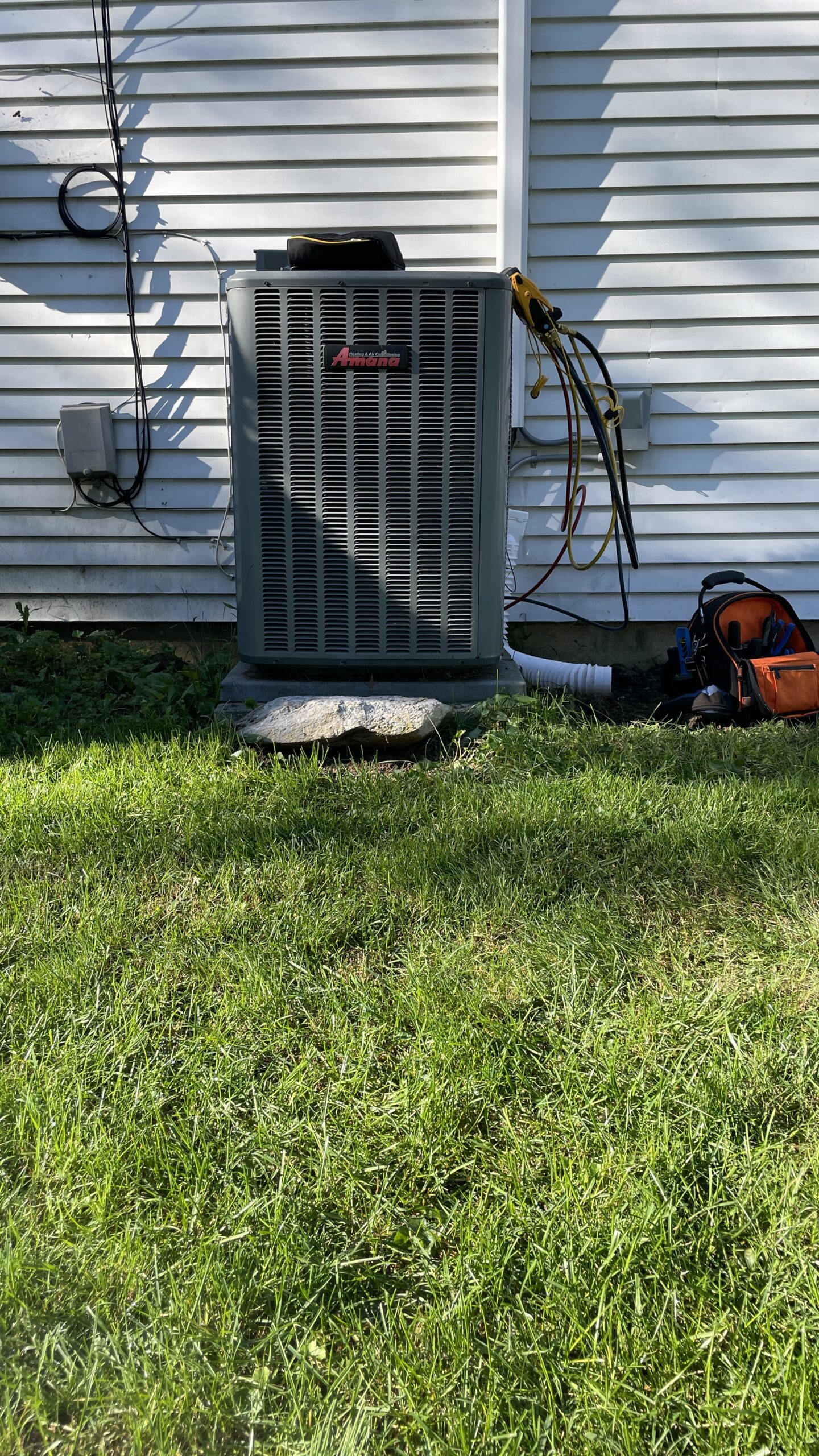 Existing outdoor HVAC equipment before replacement with a Daikin dual-fuel system in Camp Hill, PA.