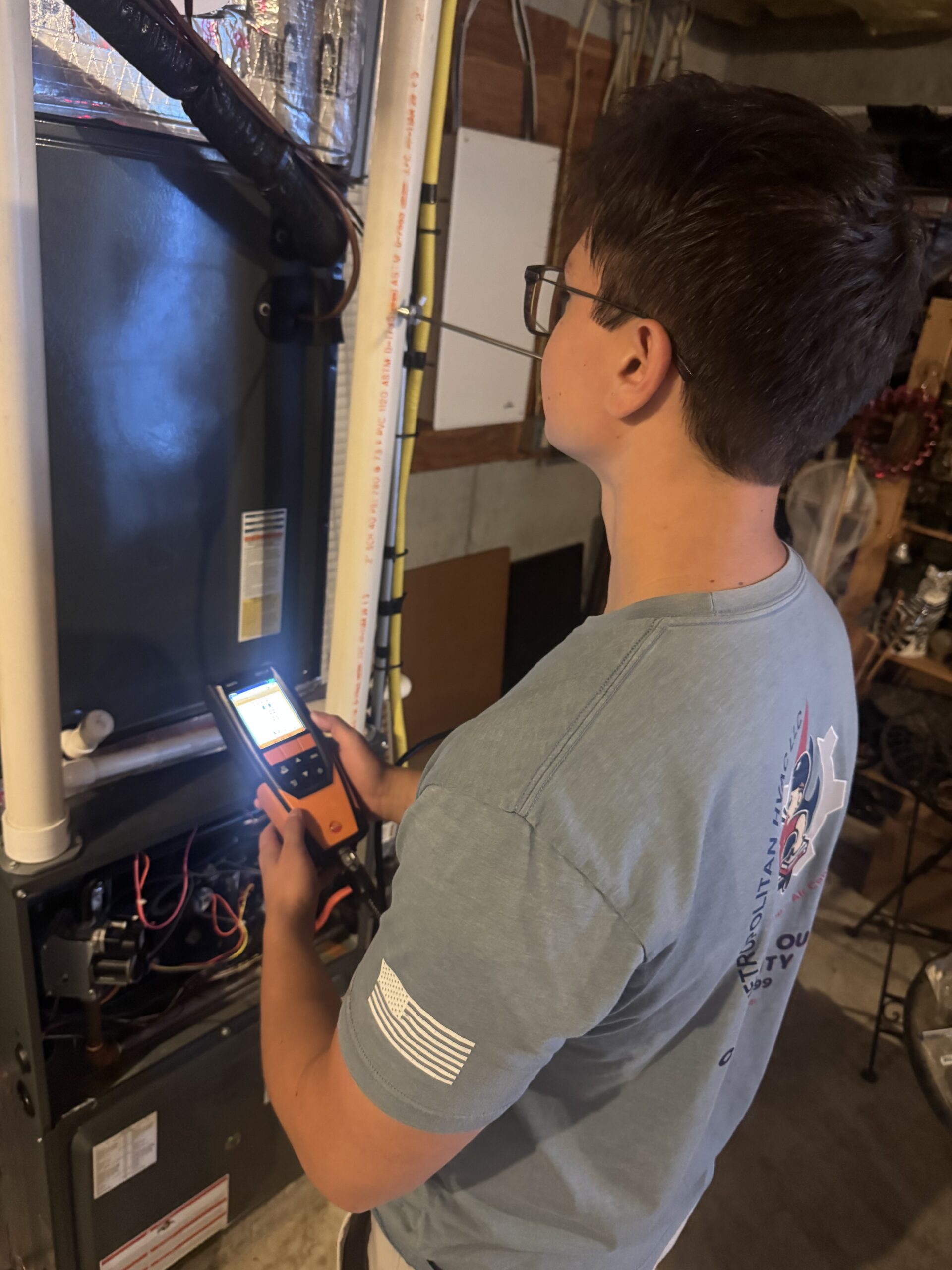 Metro HVAC technician performing combustion testing in Mechanicsburg, Pennsylvania