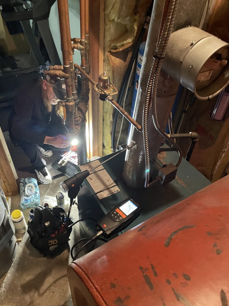 Oil-fired boiler being tested during a Metro HVAC tune-up in York Haven, PA.